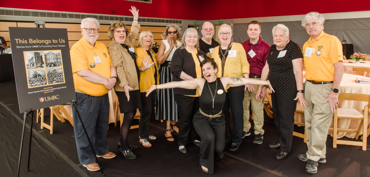 Members of UMBC's class founding four classes celebrate the launch of their book