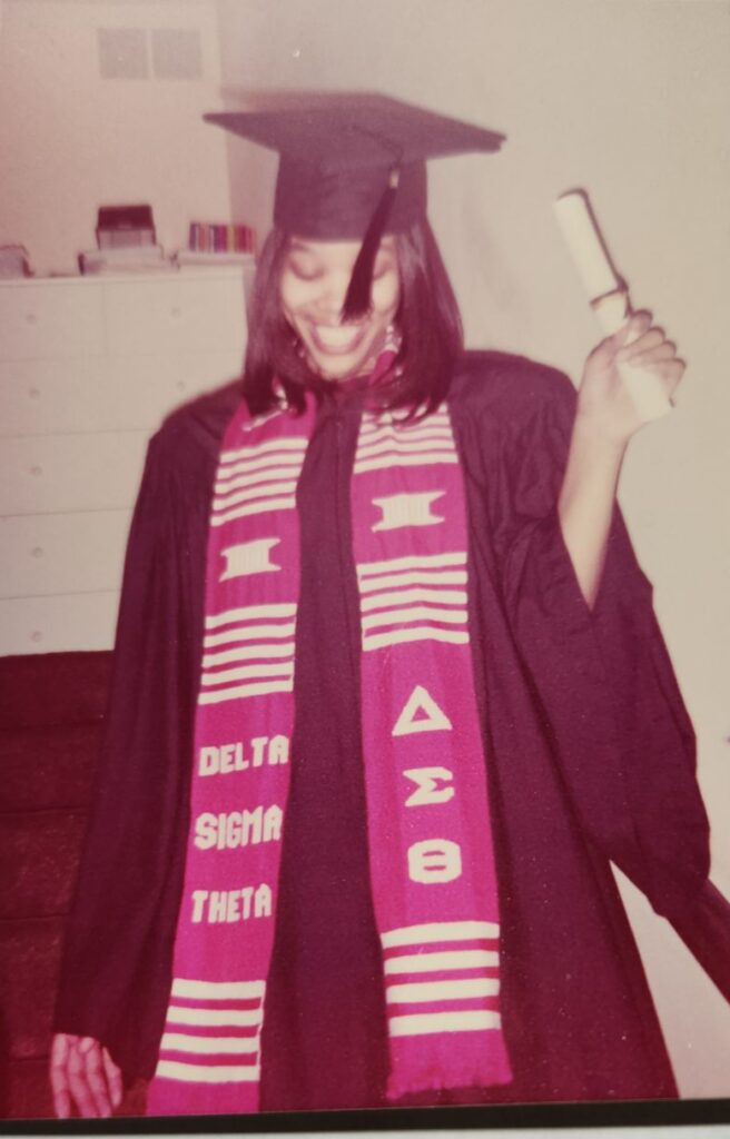Kisha Parker in her cap and gown on graduation day.
