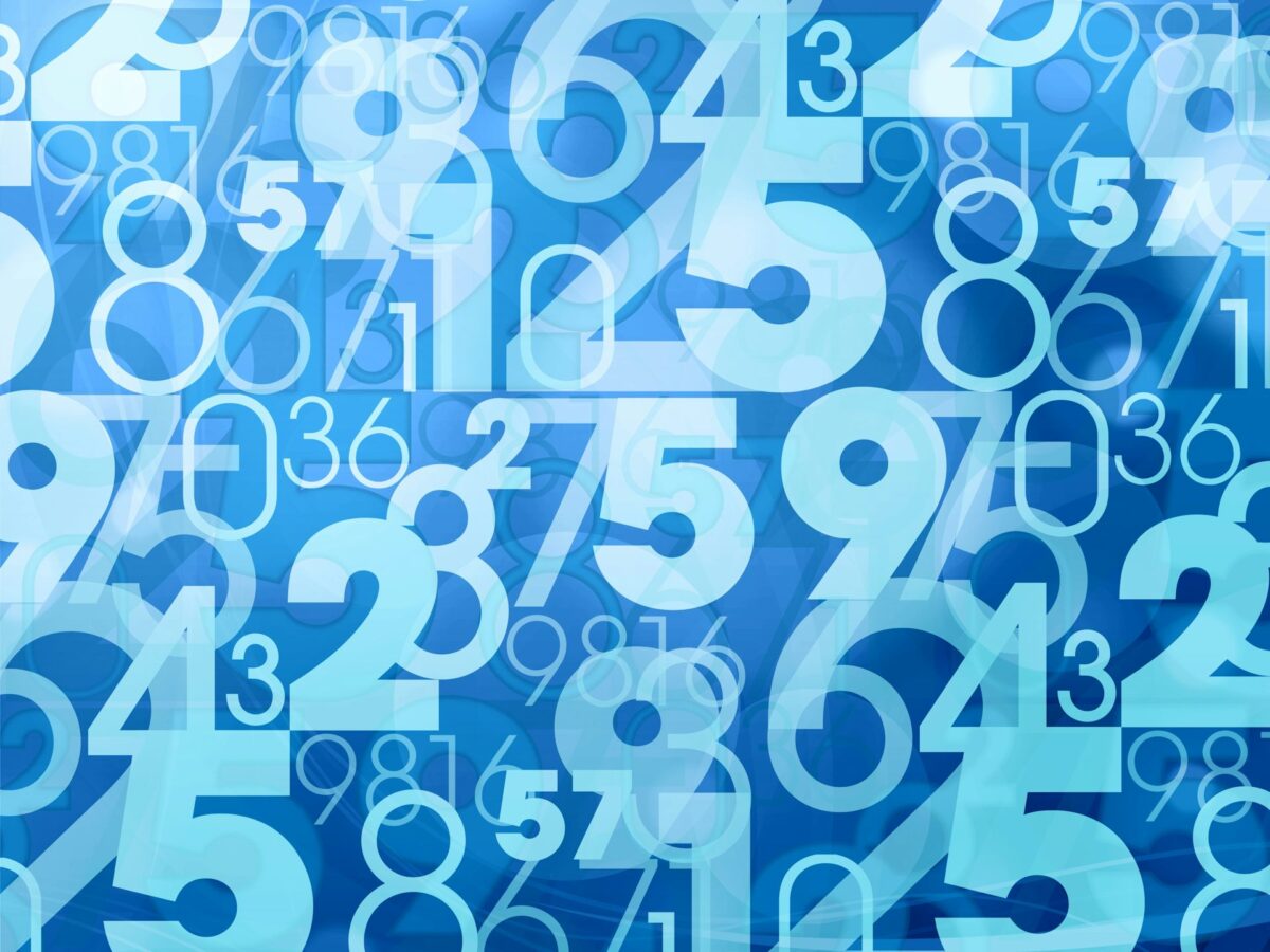 bright blue background with lots of numbers in the foreground in different sizes and shades of light blue