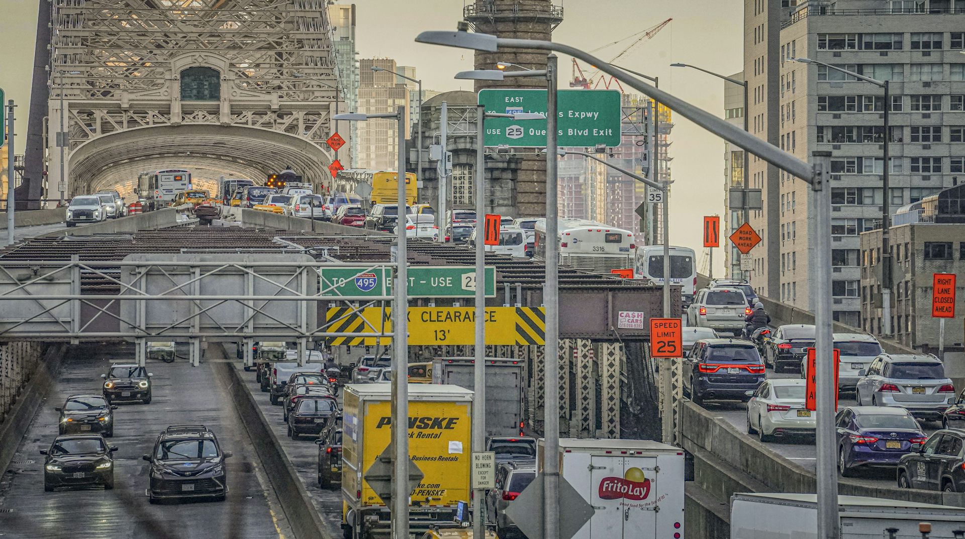 cars driving on New York City's Queensboro Bridge