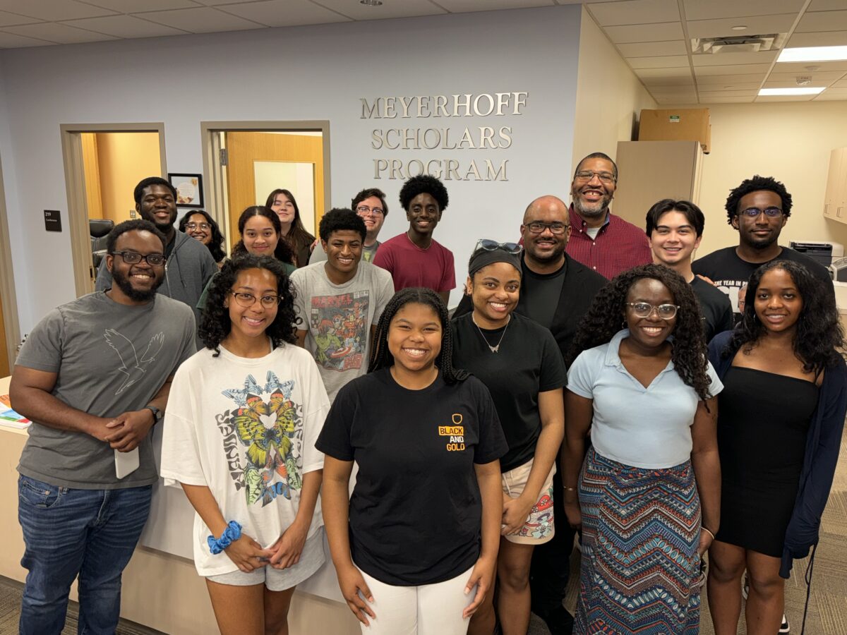 Monroe Kennedy returned to UMBC's campus recently to meet with current Meyerhoff students and tour faculty labs.