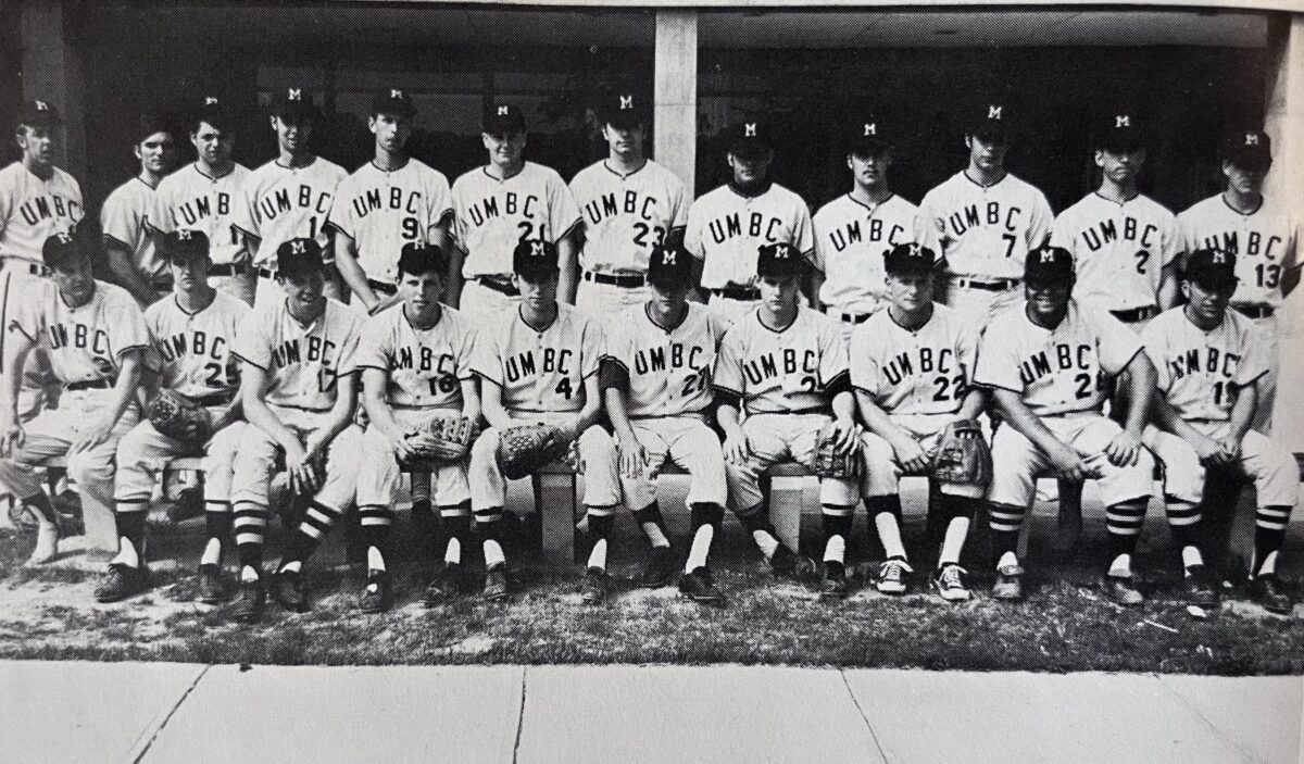 a black and white photo of a baseball team's group photo