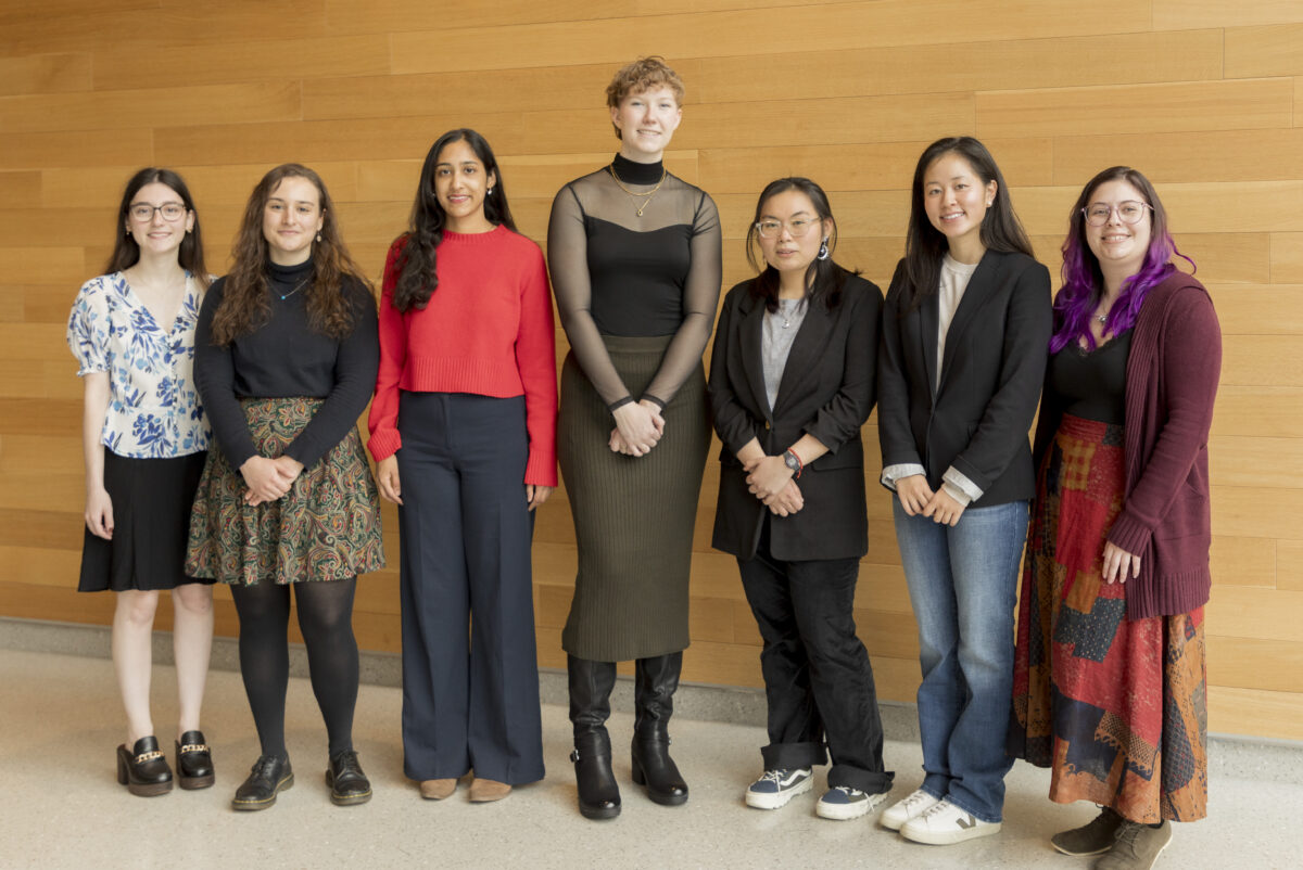 group photo of professionally dressed young women