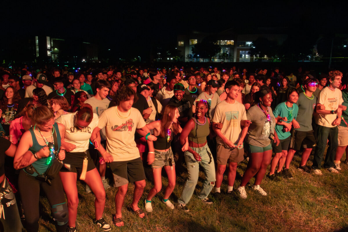 A large crowd of students are lined up and dancing. They are part of the record breaking incoming cohort of students.