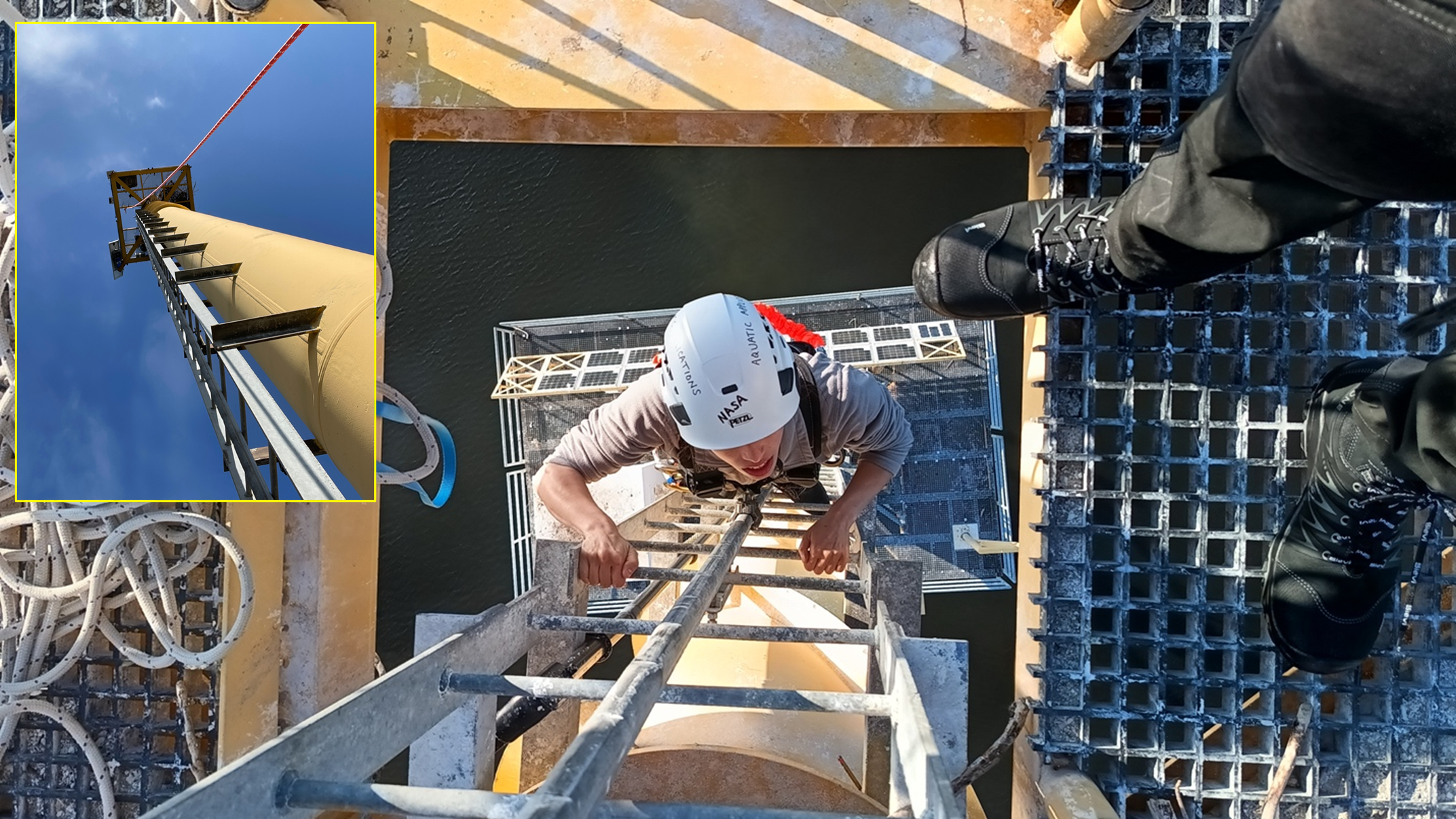 view from above - person climbing up ladder wearing construction helmet; two feet wearing boots visible on an upper platform above the climber's head; inset shows full height of tower being climbed, view up from the base