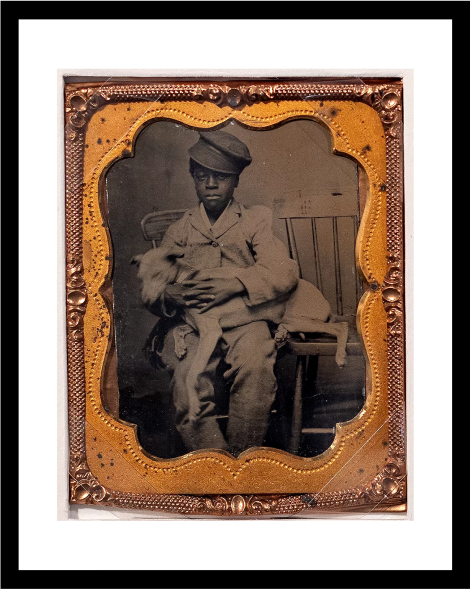 Unidentified photographer, Boy and dog, c. 1870s. Tintype. Library purchase, P78-120-006.