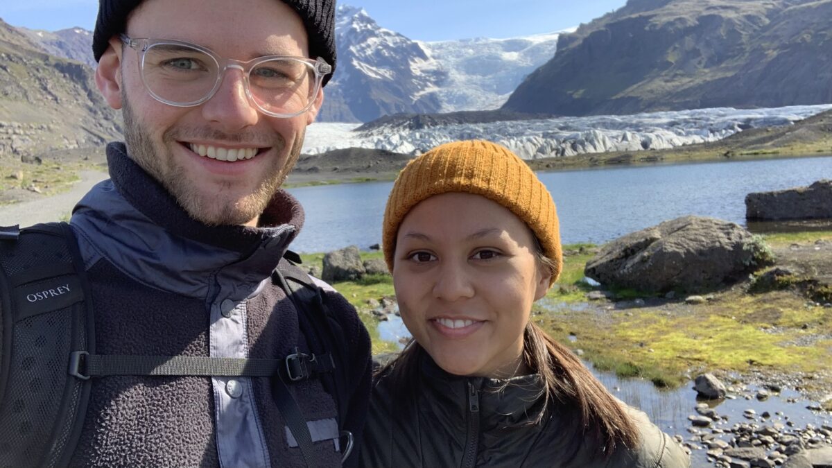 A couple traveling in the mountains of Iceland during the spring