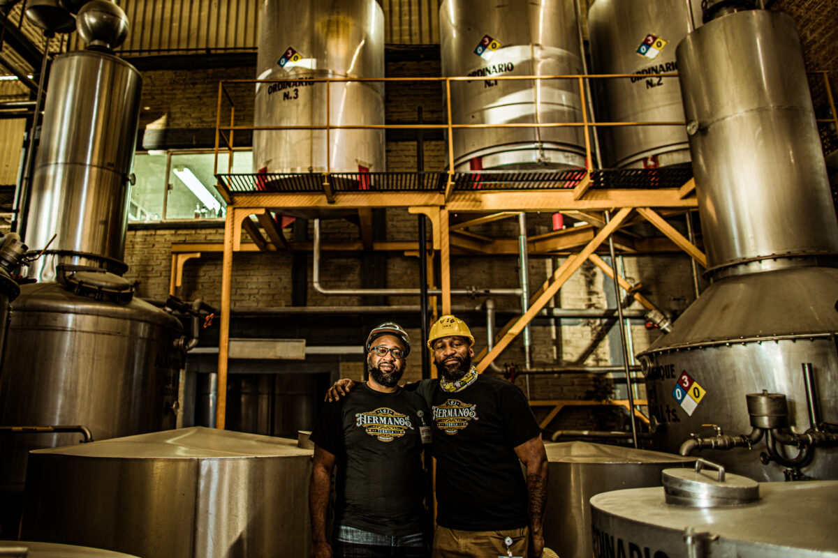 Donta and William Henson stand in Casa Maestri Brewery