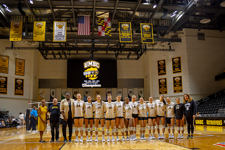 UMBC Volleyball celebrated winning the last four America East Conference tournaments. Photo by Luna Siesko for UMBC.