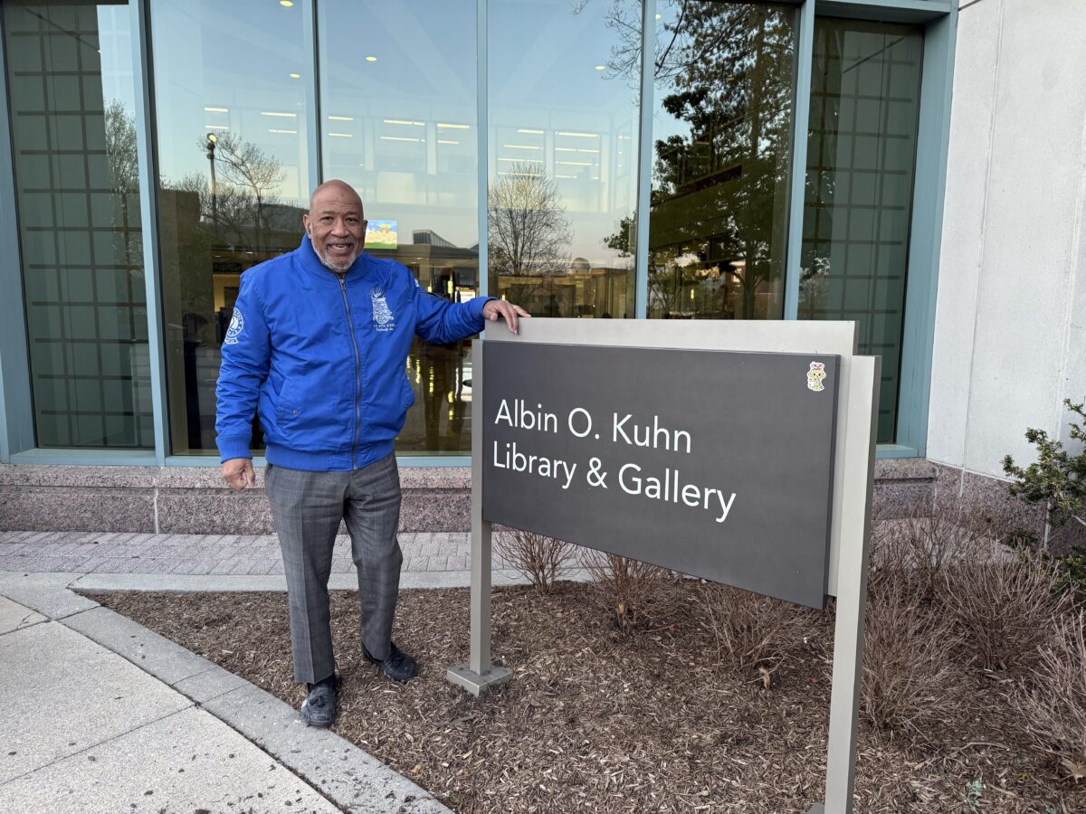 Gary Brooks ’79 in front of the AOK Library wearing his Phi Beta Sigma jacket. "Phi Beta Sigma made library study an important regular component of our pledge routine," says Brooks.