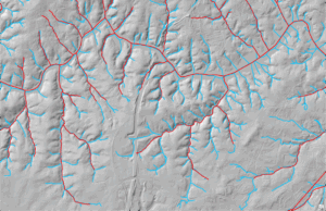 gray background topo map with many blue lines representing a stream map, fewer red lines overlaid representing the previous, less complete stream map