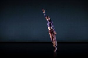 Kayla Logue dancing on stage at the Fall Dance Showcase