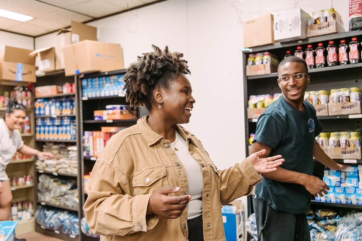 volunteers working in a food pantry