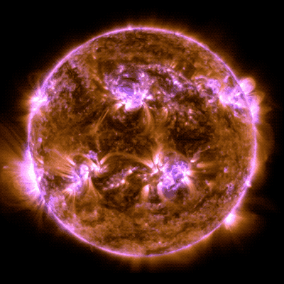 An animation of the sun shows bright flashes and loops of material emerging from the surface.