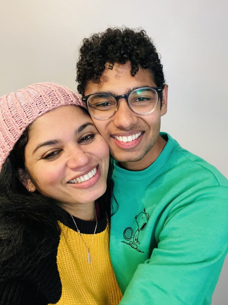 mother and son smiling and hugging