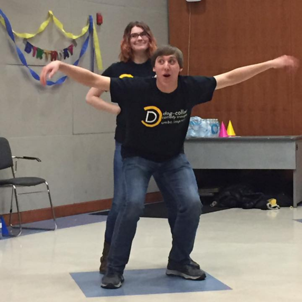 Cook during an improv show when he was a student.