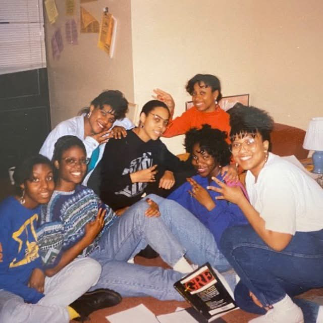 Marshall and several members of Sigma Gamma Rho hanging out in one of the apartments on campus.