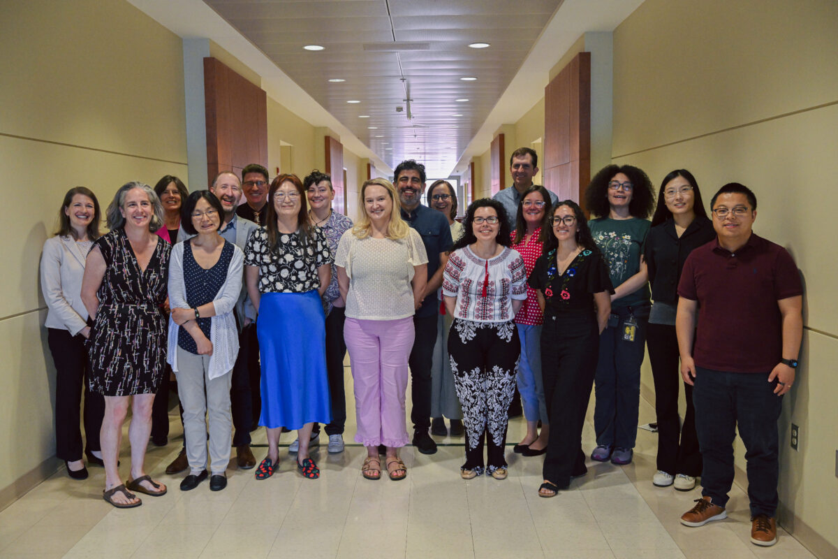 large group photo in hallway