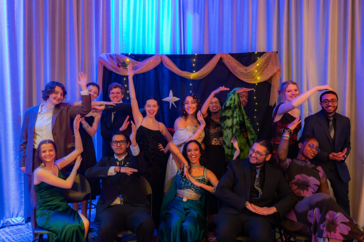 a group of people pose after a dance