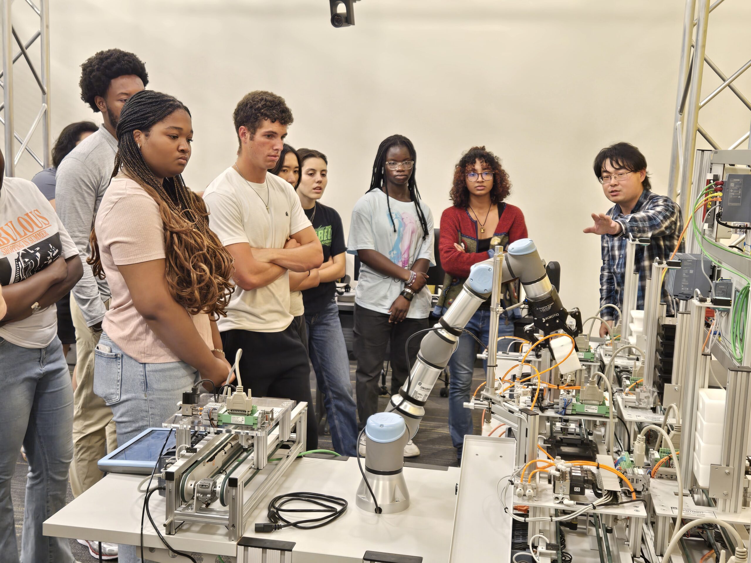 UMBC CWIT Scholars during a lab visit to Dr. Nilanjan Banerjee's lab in Fall 2025. The lab is the CREM – Center for Research in Emergent Manufacturing.