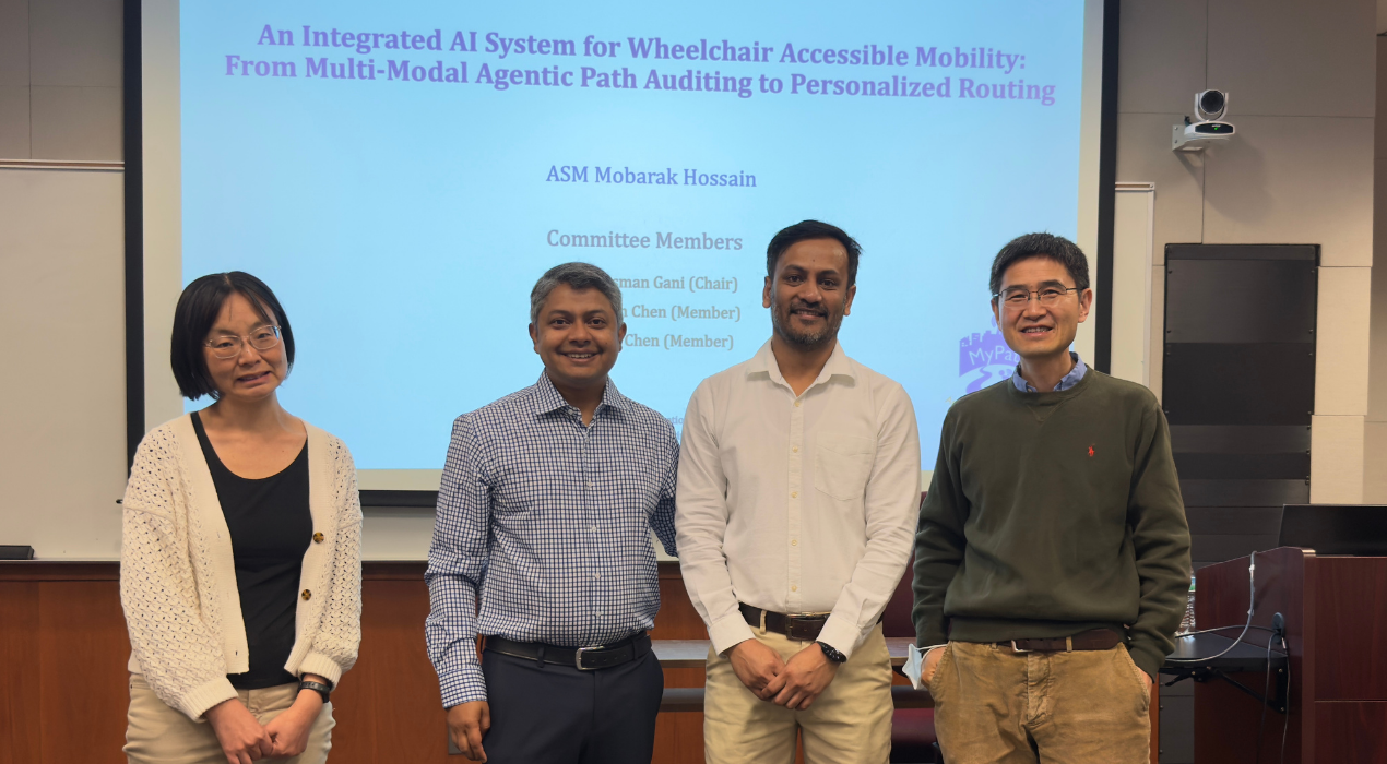 ASM Mobarak Hossain after his master’s thesis defense at UMBC. From left to right: Dr. Karen Chen, Dr. Md Osman Gani, Hossain, and Dr. Zhiuyan Chen.