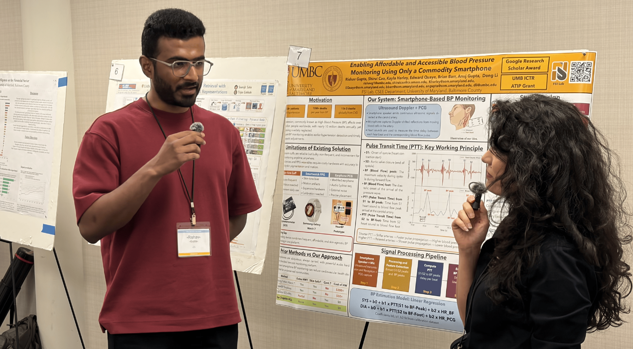 Rishav Gupta at UMBC COEIT Research Day 2026 in front of his poster, "Enabling Affordable and Accessible Blood Pressure Monitoring Using Only a Commodity Smartphone."